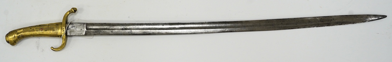 A composite short sword, British military blade by Reeves with Continental brass hilt, blade 66.5cm. Condition - fair